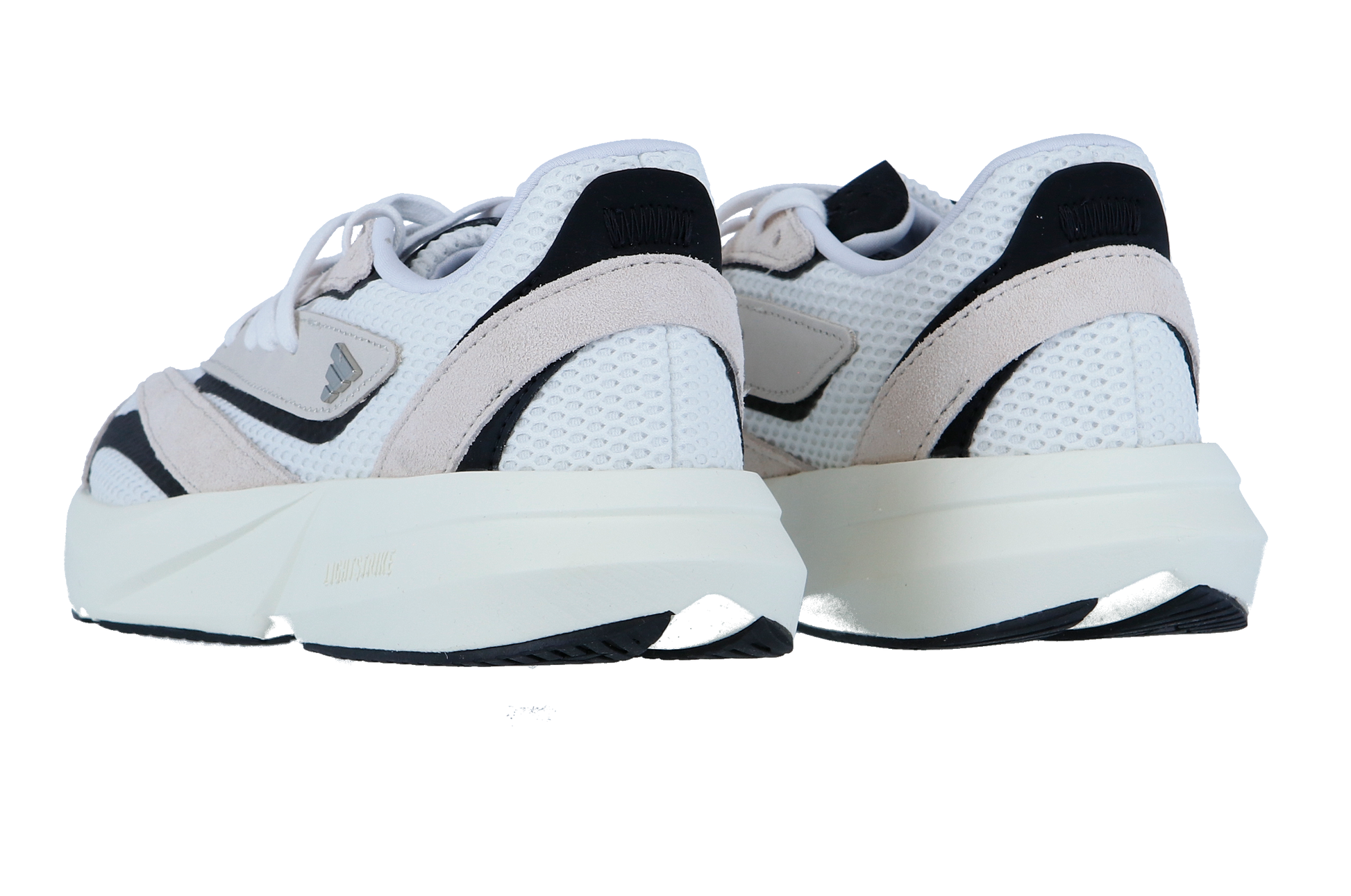 Zwei weiß-beigefarbene Adidas LIGHTBLAZE Sneaker mit schwarzen Akzenten wenden sich von der Kamera ab und präsentieren ihre Mesh-Textur, die klobigen Sohlen und die charakteristische LIGHTSTRIKE-Zwischensohle vor einem weißen Hintergrund.