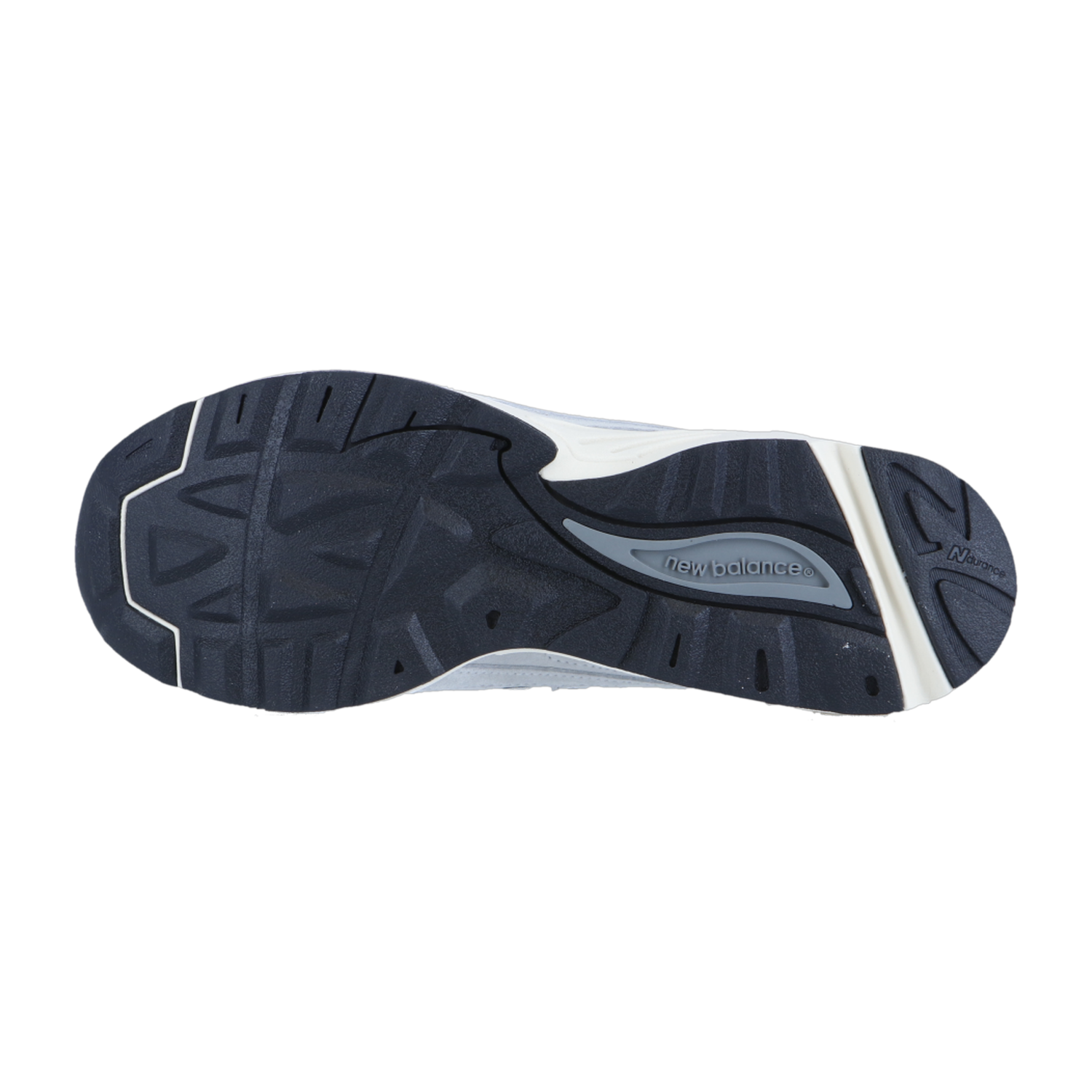 Das Bild zeigt die schwarz-weiße Gummilaufsohle des New Balance CM878V1 mit dem Logo, einem strukturierten Profil für Grip und Traktion und der ABZORB-Dämpfung.