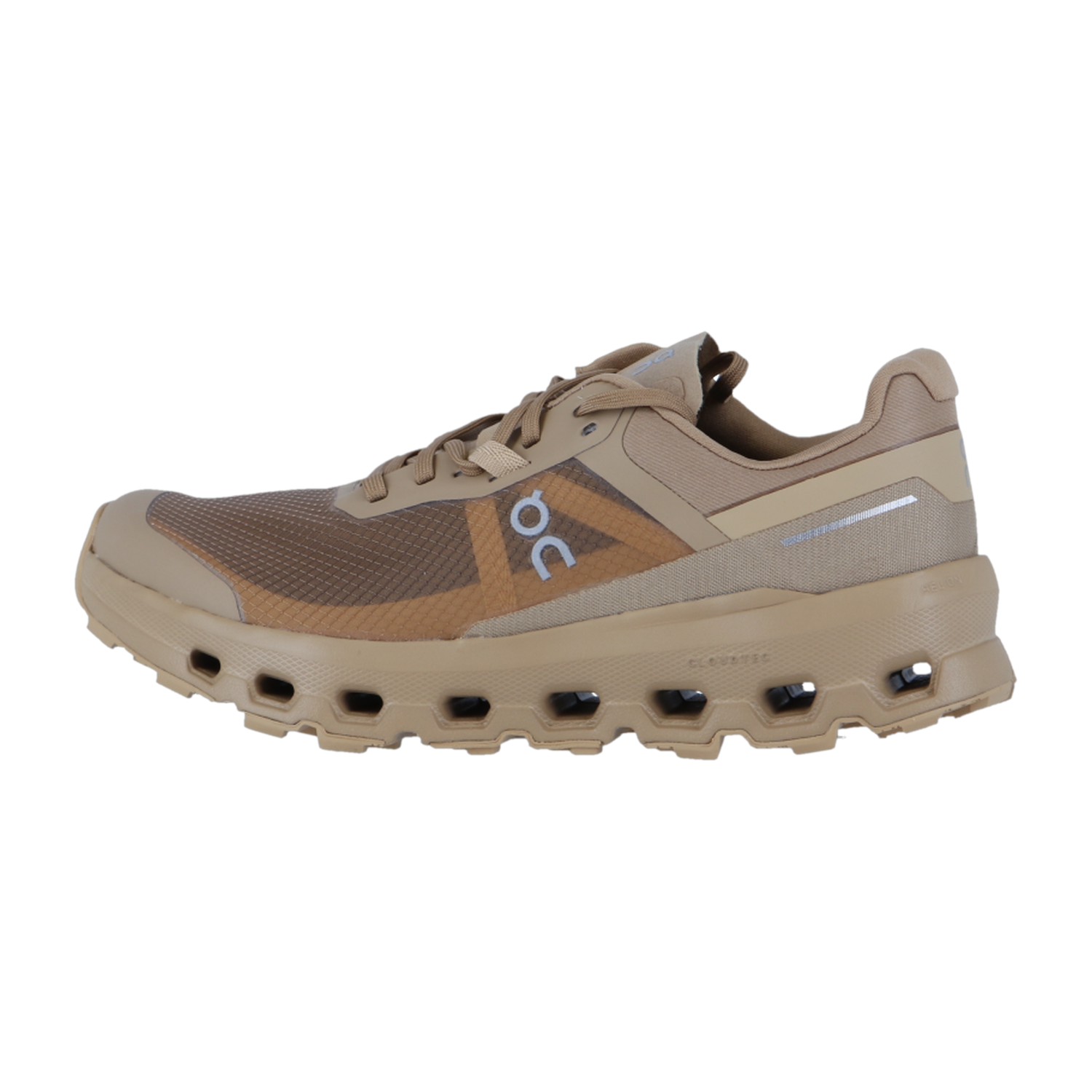 Der On CLOUDVISTA 2 ist ein hellbrauner, sportlicher Sneaker mit Mesh-Obermaterial, CloudTec-Dämpfung in der Sohle mit großen rechteckigen Aussparungen, Schnürverschluss und ON-Branding an der Seite.