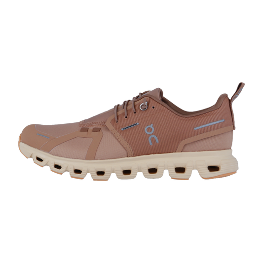 Der On CLOUD 6 WP ist ein rosa-brauner Sportschuh mit cremefarbener CloudTec-Dämpfungssohle, Obermaterial aus Mesh und Synthetik, Schnürung vorne, wasserdichtem Design, tiefen Aussparungen und ON-Logo an der Seite.