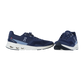 Ein Paar marineblaue On CLOUDRIFT-Sneaker mit weißer Sohle, dargestellt auf weißem Hintergrund. Ein Schuh ist von der Seite gezeigt, während der andere angewinkelt ist, um die Vorderseite und die charakteristische CloudTec-Dämpfung zu zeigen.