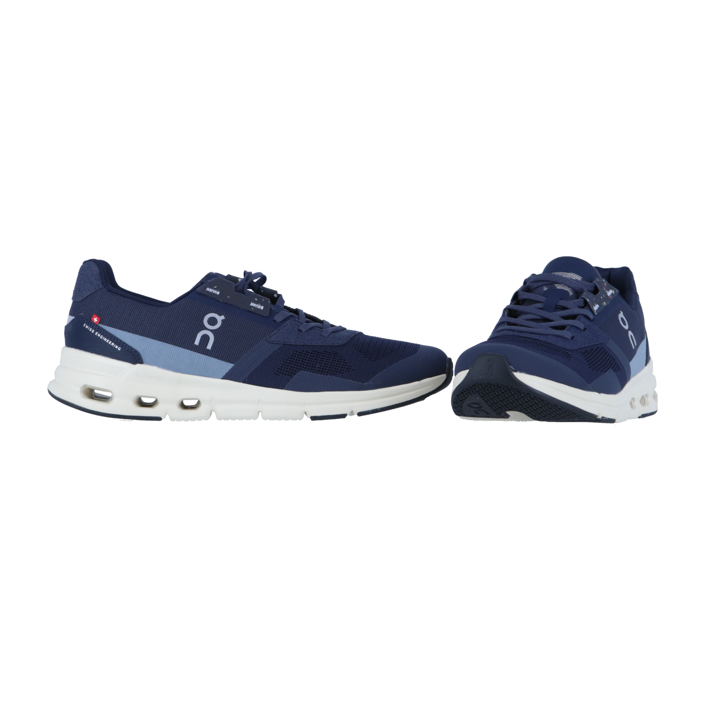 Ein Paar marineblaue On CLOUDRIFT-Sneaker mit weißer Sohle, dargestellt auf weißem Hintergrund. Ein Schuh ist von der Seite gezeigt, während der andere angewinkelt ist, um die Vorderseite und die charakteristische CloudTec-Dämpfung zu zeigen.