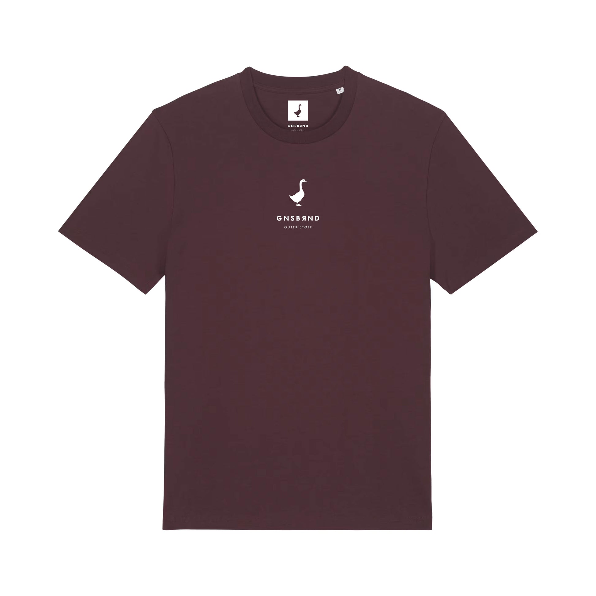 Das Liebesdorf Shirt von GNSBRND ist ein schlichtes, dunkelbraunes Unisex-T-Shirt mit kleinem weißen Seepferdchen-Logo und "ONS&OND Better Story" auf der Brust. Es ist aus weicher Bio-Baumwolle gefertigt und zeigt im Nacken das Seepferdchen-Logo und den Markennamen.