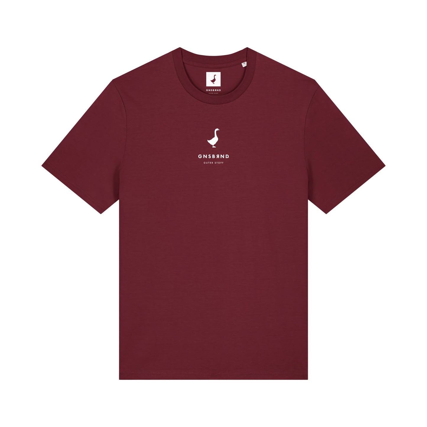 Das Liebesdorf Shirt von GNSBRND ist ein schlichtes kastanienbraunes Unisex-T-Shirt aus Bio-Baumwolle. Es hat kurze Ärmel und ein kleines weißes Logo mit "GNSSAND SINCE 2019" mittig auf der Brust.