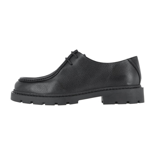 Der BIANCO BIAJEFF ist ein schwarzer, eleganter Damenschuh aus Leder mit strukturierter Oberfläche und einer dicken, robusten Gummisohle, die im Seitenprofil auf weißem Grund abgebildet ist.