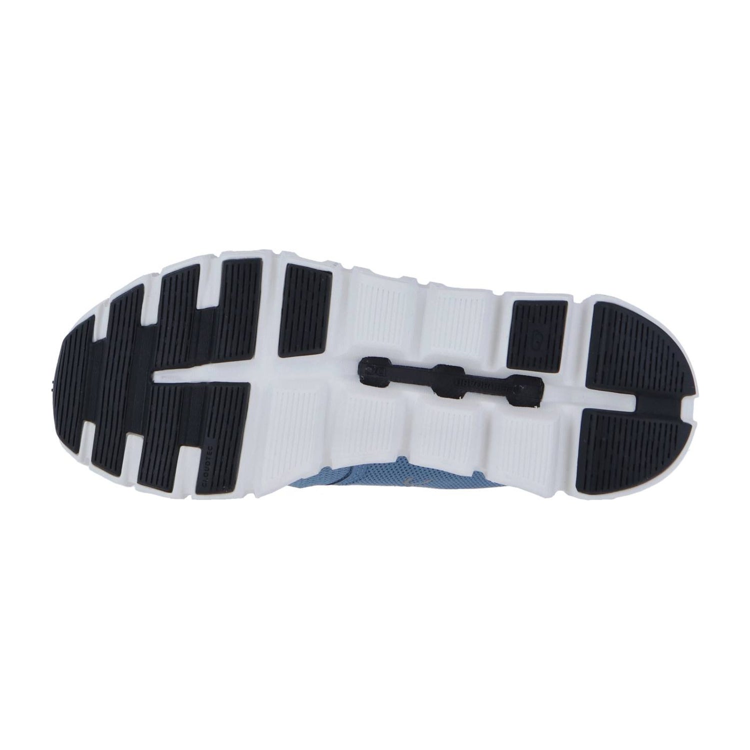 Das Bild zeigt die Unterseite der Sohle des On CLOUD 6, die ein schwarz-weißes, segmentiertes Gummiprofil in einem Gittermuster mit CloudTec-Dämpfung für verbesserte Traktion und Flexibilität aufweist.